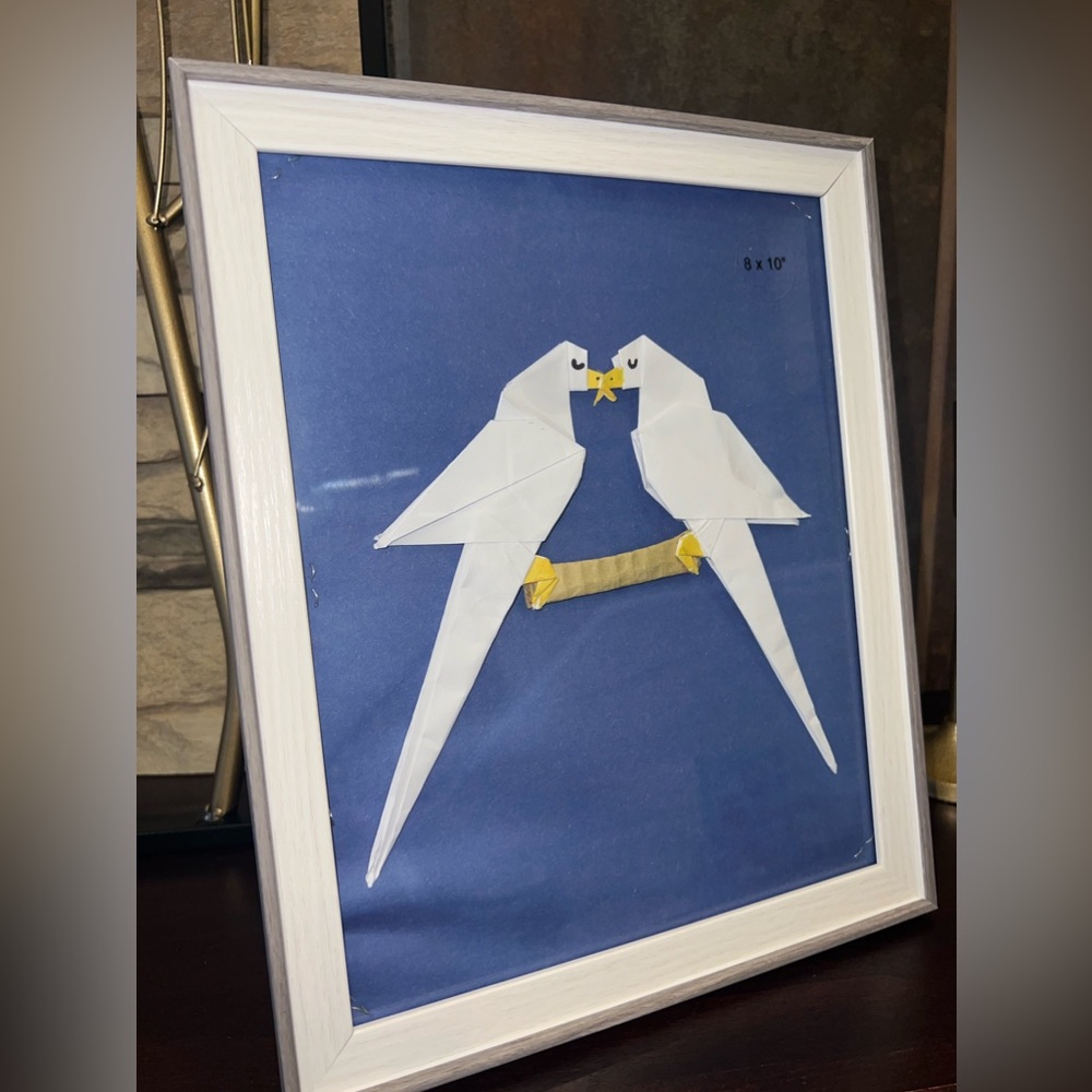 Handmade origami love birds